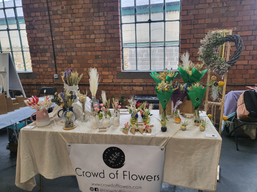 Crowd of Flowers Stand at Elsecar Heritage Centre showing the various floral displays on offer